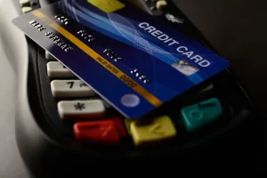 credit card sitting on top of a card reader